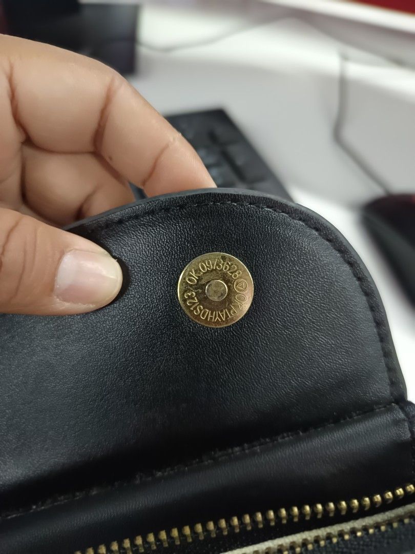 Christian Dior sling bag (Category: Luxury Bags & Wallets) located in Cebu City. Submitted by negotiableprice22 (Listing ID 1446867681, Image 3). Description: CHRISTIAN DIOR Sling bag made in Italy super ganda po, nakaw pansin talaga gamitin sa occasions or sa work BIG FONT SPELL DIOR sa harap at monogram din sya / rare na design as I observe sa carousell sa sling naman nya ay naka spell out ang branding nya pwede cross body bag pwede sling bag a