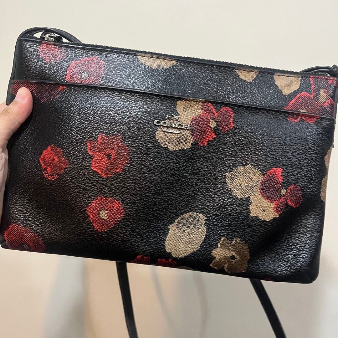 Coach Floral Crossbody Bag (Category: Luxury Bags & Wallets) located in Taytay. Submitted by second_couturecache (Listing ID 1446841217, Image 3). Description: May sign of use, re-attached yung sling, may flaw sa hardware. Kindly self-authenticate! Selling for reasonable price so manage your expectation! First to pay basis and payment first. Other Delivery option shouldered by buyer: Lalamove or J&T. Location: Taytay, Rizal.