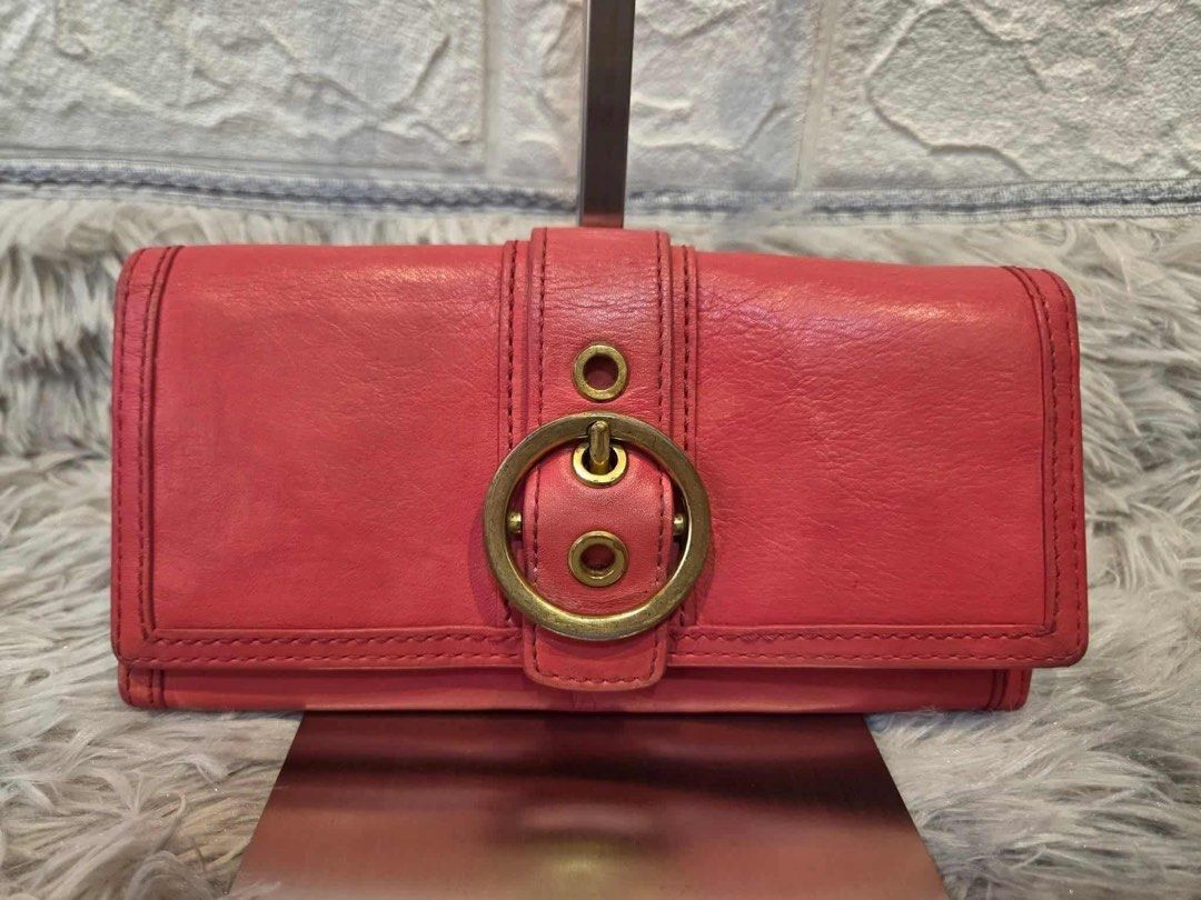 Coach Pink Leather Trifold Wallet with Buckle (Category: Wallets & Card holders) located in Manila. Submitted by aaannemv (Listing ID 1446833501, Image 1). Description: - Coach trifold wallet - Lovely pink shade - Genuine leather material - Gold buckle closure - Ample card slots - Zippered coin pocket - Clean interior - Ideal for organizing essentials LAST PRICE POSTED PASIG/TAYTAY 📍.