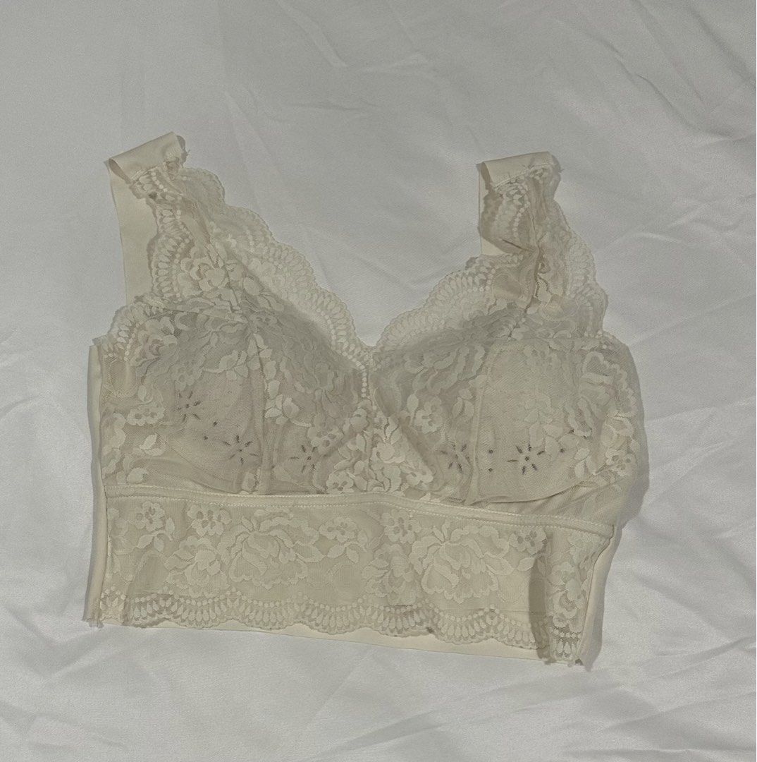 Cream Lace Bralette (Category: New Undergarments & Loungewear) located in Kuala Lumpur. Submitted by naominesha30477 (Listing ID 1446795464, Image 1). Description: - Cream colored lace bralette - Features delicate scalloped edges - Made from comfortable and stretchy material - Versatile for layering or wearing as a standalone piece - Unpadded design Never worn before. Bought from Thailand. Quality super good.