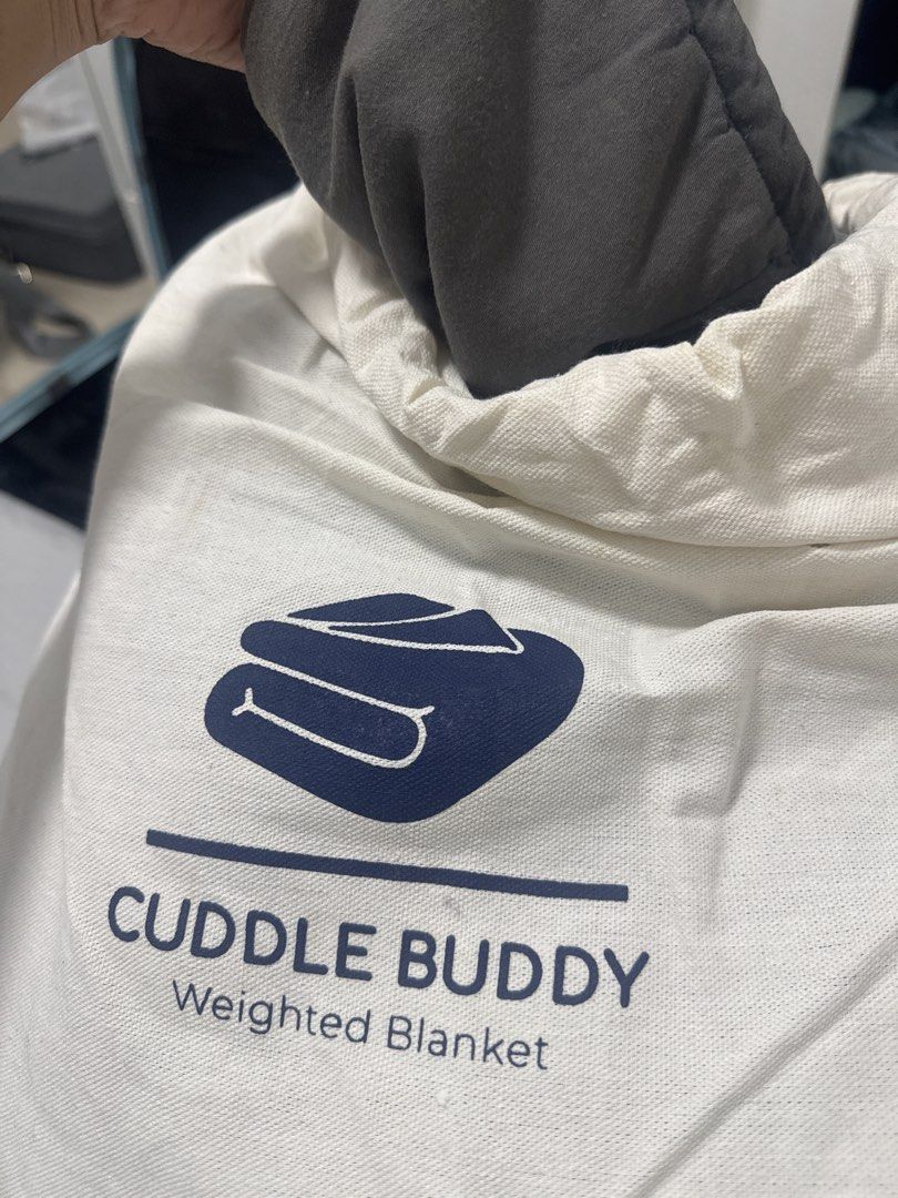 Cuddle Buddy Weighted Blanket (Category: Bedding & Towels) located in Quezon City. Submitted by fatolents47811 (Listing ID 1446884704, Image 2). Description: - Cuddle Buddy 15 kg weighted blanket - Color: Grey - Queen sized.