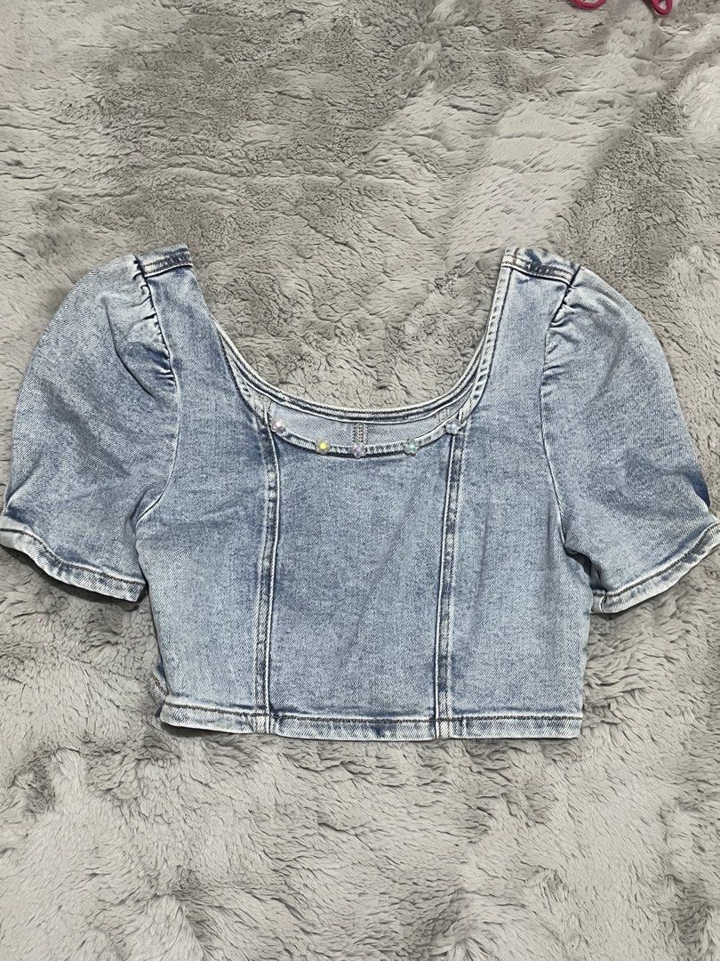 Denim Puff Sleeve Square Neck Crop Top (Category: Others Tops) located in Manila. Submitted by acbdacbd (Listing ID 1446886866, Image 1). Description: - Light wash denim crop top - Short puff sleeves - Square neckline with colorful embellishments - Cropped length - Ideal for pairing with high-waisted bottoms (jeans, skirts).
