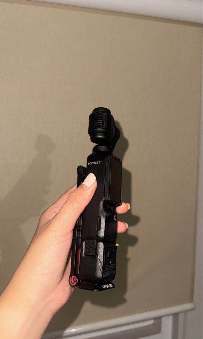 DJI Osmo Pocket 3 Creator Combo with Accessories (Category: Cameras) located in Makati City. Submitted by severusss (Listing ID 1446865359, Image 3). Description: - DJI Osmo Pocket 3 Creator Combo - Includes camera, tripod, wireless microphone, charging cable, and other accessories except wide angle lens - Ideal for vlogging and capturing incredibly smooth footage. - All items are in good working condition. - 90% smooth, got some little scratches