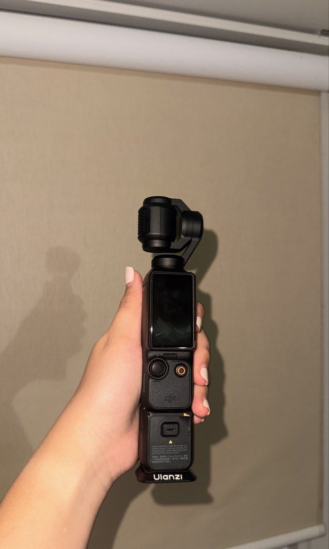 DJI Osmo Pocket 3 Creator Combo with Accessories (Category: Cameras) located in Makati City. Submitted by severusss (Listing ID 1446865359, Image 2). Description: - DJI Osmo Pocket 3 Creator Combo - Includes camera, tripod, wireless microphone, charging cable, and other accessories except wide angle lens - Ideal for vlogging and capturing incredibly smooth footage. - All items are in good working condition. - 90% smooth, got some little scratches