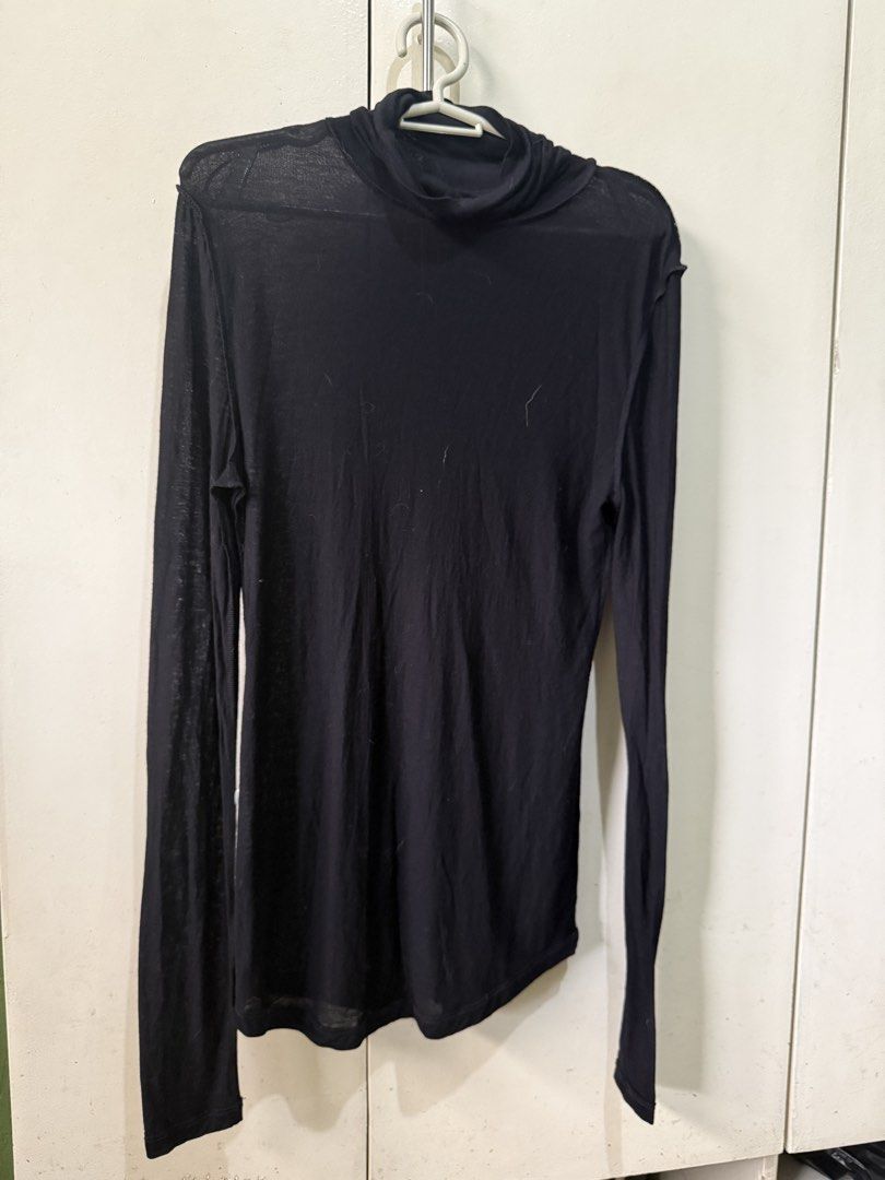 DKNY Black Long Sleeve Turtleneck Top Size S (Category: Longsleeves) located in Marikina City. Submitted by moonchok (Listing ID 1446790326, Image 1). Description: - Brand: DKNY - Color: Black - Style: Long sleeve turtleneck - Fabric: cotton light - Size: S - Origin: Made in China - Versatile: Great for layering or wearing solo.