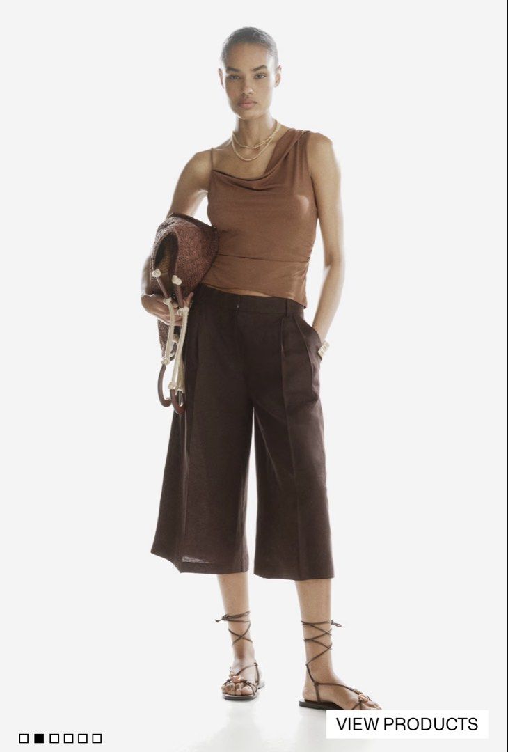 Draped Asymmetric Top - Brown (Category: Blouses) located in Kuala Lumpur. Submitted by jvjv.wee (Listing ID 1446827092, Image 2). Description: - Stylish brown draped top - Asymmetric one-shoulder design - Elegant cowl neck - Flattering ruched detailing on the side - Made from lightweight, flowy fabric.
