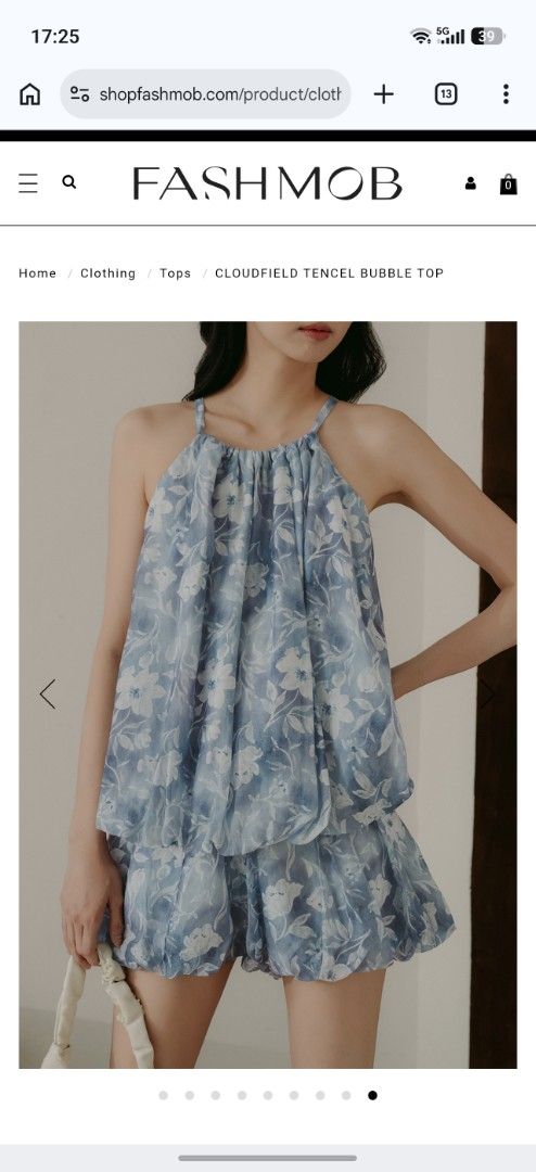 BNWT [FASHMOB]Cloudfield Tencel Bubble Top (Category: Blouses) located in Kuala Lumpur. Submitted by suziestash (Listing ID 1446816439, Image 1). Description: - Cute blue floral top from FASHMOB - Made from light and airy Tencel material - Features a stylish bubble hem design - Halter neck with adjustable straps for a perfect fit - Ideal for casual wear or beach outings - Pairs well with shorts or skirts.