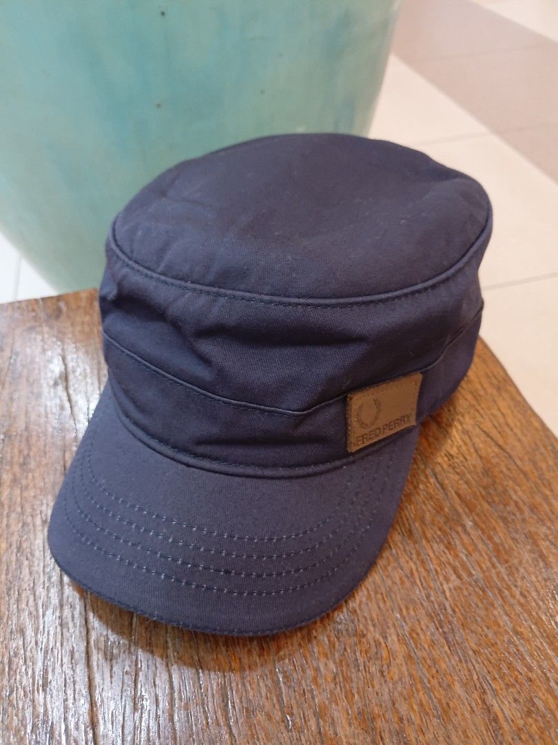 Fred Perry Melitary cap.size medium no issue (Category: Activewear) located in Urdaneta. Submitted by safetrifterold76 (Listing ID 1446730556, Image 1). Description: fred perry melitary cap.size medium.no issue.