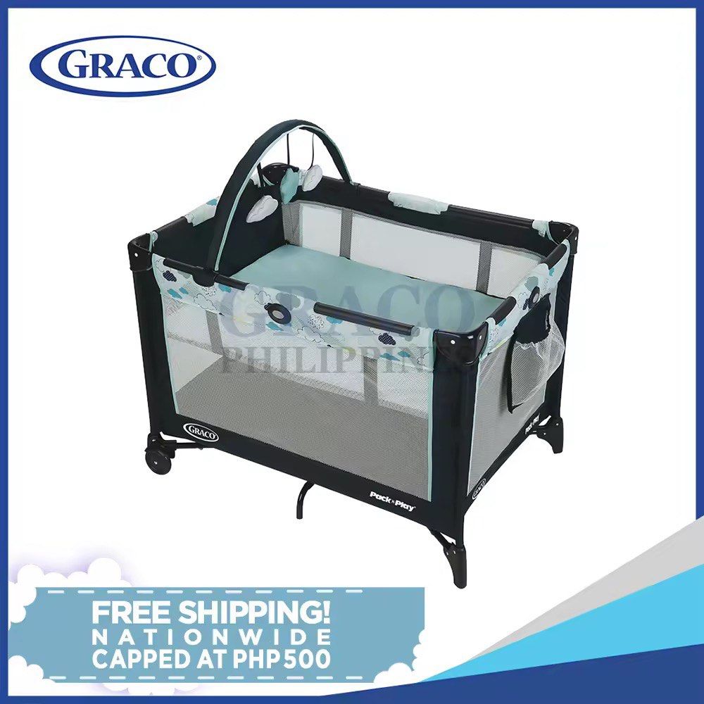 Graco Pack 'n Play Playard (Category: Cots & Cribs) located in Pasig City. Submitted by miso1219 (Listing ID 1446904072, Image 1). Description: - Graco Pack 'n Play playard - Navy blue with cute cloud pattern accent - Mesh sides for excellent ventilation - Includes a comfortable padded mattress - Equipped with wheels for easy transport - Ideal for baby's naps and playtime.