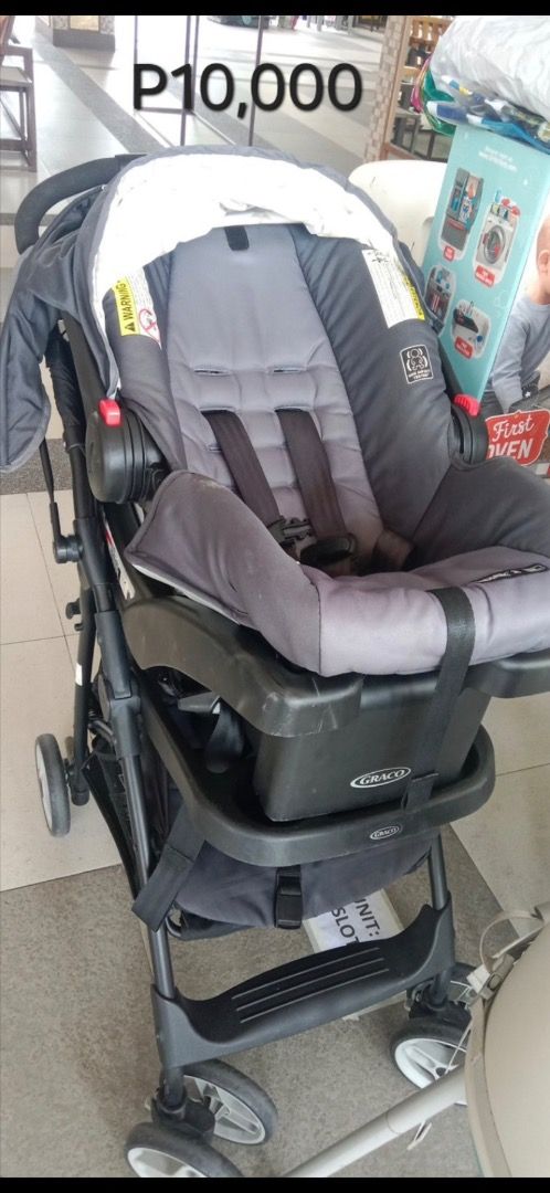 Graco Stroller and Car Seat Travel System (Category: Strollers) located in Quezon City. Submitted by shopus2mnl (Listing ID 1446808285, Image 1). Description: - Graco travel system including stroller and infant car seat - Car seat securely clicks into stroller - Suitable for newborns and toddlers - Easy to maneuver - Minor scuffs on frame from normal use - Price is firm.