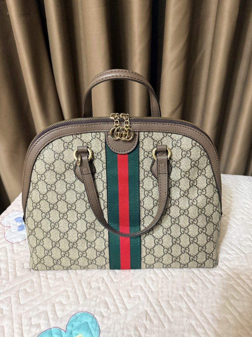 Gucci Ophidia GG Supreme Monogram Dome Bag (Category: Luxury Bags & Wallets) located in Las Pinas. Submitted by happyluv0302 (Listing ID 1446728624, Image 2). Description: - Gucci Dome Bag - Classic GG Monogram Canvas - Signature Green and Red Stripe - Gold-tone Hardware with Double G Charm - Interior Zip Pocket - Includes Gucci Card - Ideal for Everyday Use - never use 🔹call/txt 09175681108.