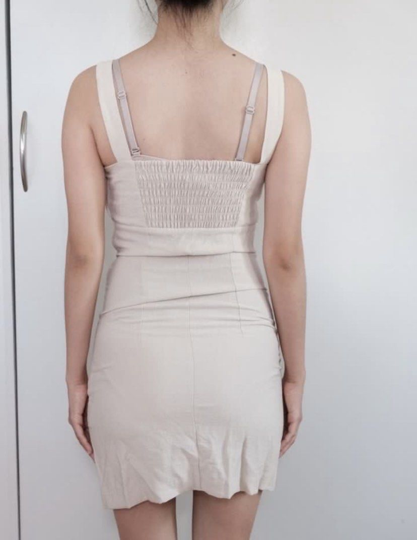 H&M Smocked Bust Mini Dress Beige (Category: Dresses) located in Manila. Submitted by plmarn (Listing ID 1446893362, Image 2). Description: - Cute beige mini dress from H&M - Features a smocked bust - Simple and chic design .