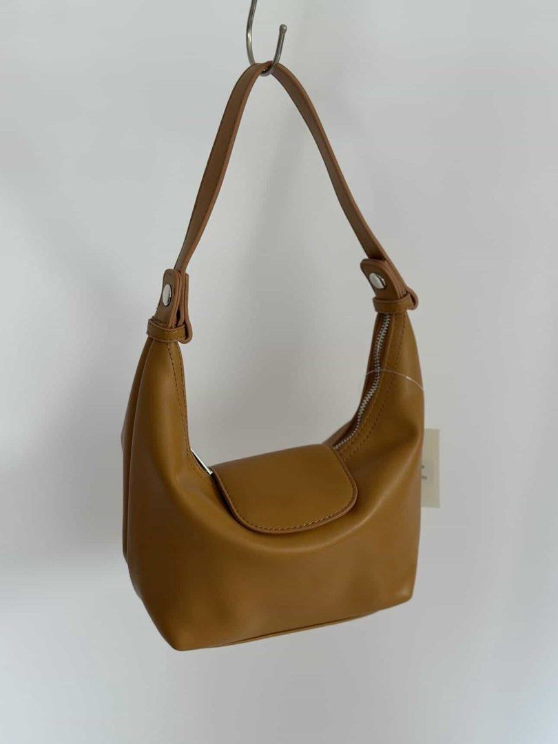 Hobo Shoulder Bag - Light Green / Tan (Category: Shoulder Bags) located in San Pedro. Submitted by thrift.17 (Listing ID 1446809156, Image 2). Description: - leather dumpling bag - Available in pastel green and classic tan - with 2 straps.