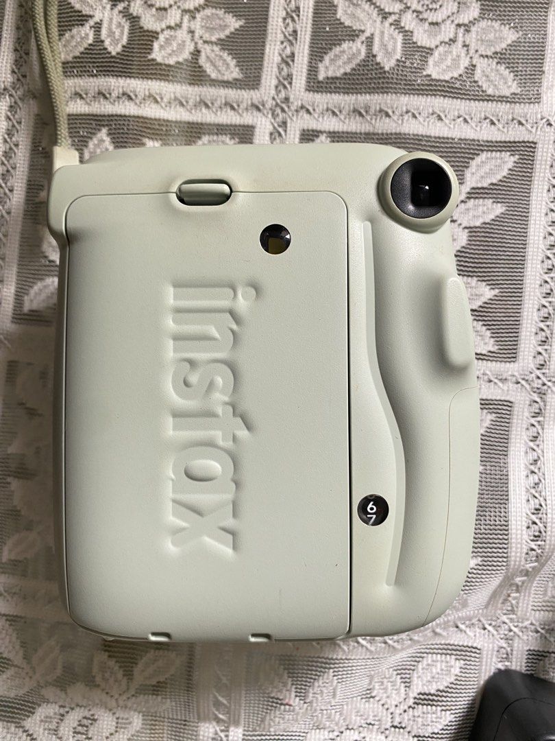 Instax Mini 11 - Sage Green (Category: Cameras) located in Naga. Submitted by sam.23_ (Listing ID 1446800815, Image 2). Description: 🏷️ ₱3,000 - rfs: for upgrade - used only a few times - has minor scratches, barely noticeable - 100% fully functional - includes free acrylic case and battery - no box send me a message for more inquiries and for legitimacy!.