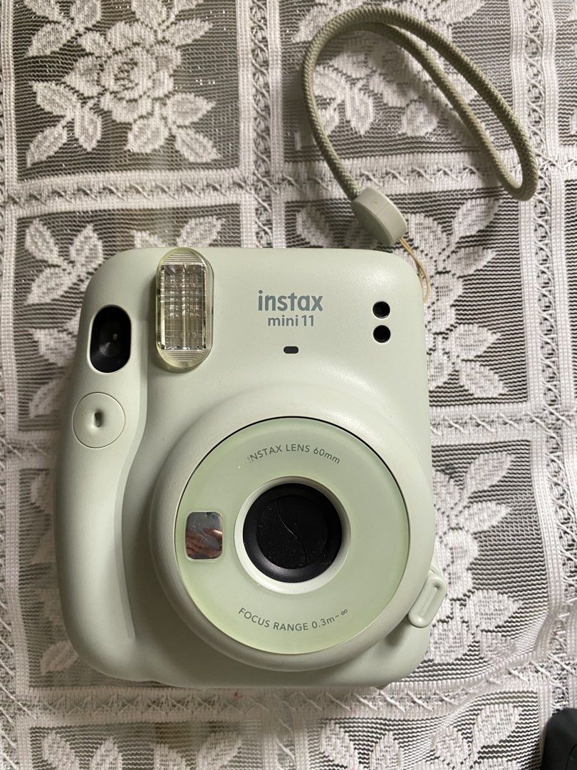 Instax Mini 11 - Sage Green (Category: Cameras) located in Naga. Submitted by sam.23_ (Listing ID 1446800815, Image 1). Description: 🏷️ ₱3,000 - rfs: for upgrade - used only a few times - has minor scratches, barely noticeable - 100% fully functional - includes free acrylic case and battery - no box send me a message for more inquiries and for legitimacy!.
