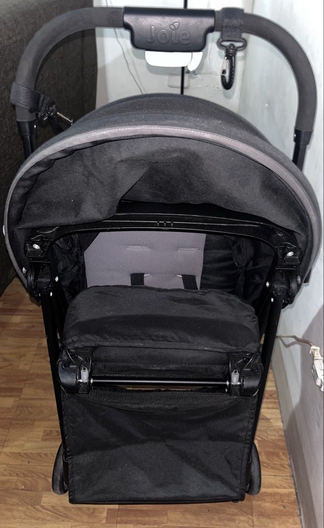 Joie Stroller - Black (Category: Strollers) located in Quezon City. Submitted by mcv1102 (Listing ID 1446740009, Image 3). Description: Light weight ideal for 6-60 months Black Joie stroller. Features canopy, harness, padded seat, storage basket, and functional wheels. Folds for easy storage. Great for travel..