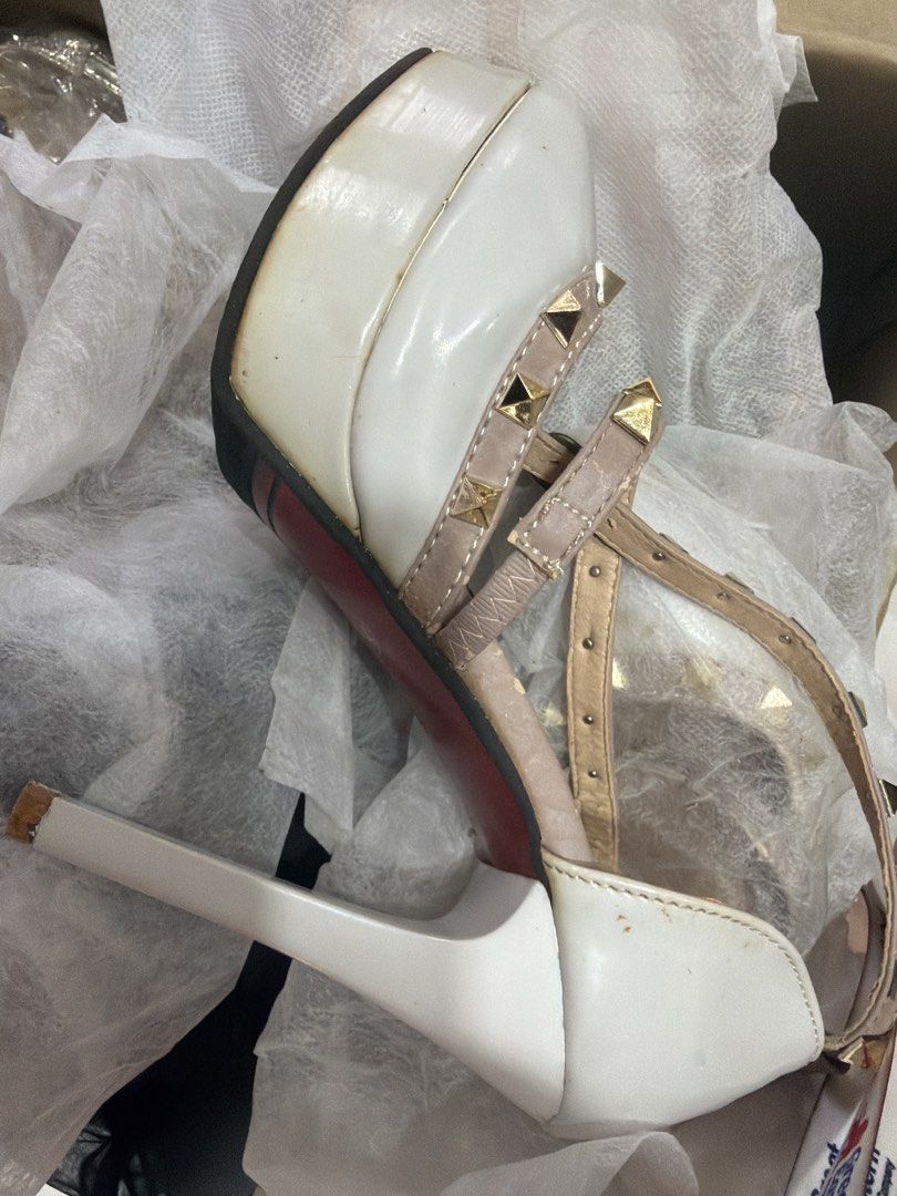 KALIFU White Studded Pointed Toe Heels Size 34 (Category: Heels) located in Kajang. Submitted by Infinity666 (Listing ID 1446799946, Image 2). Description: - White pointed toe heels - Beige straps with studded details - Platform sole with red bottom - Buckle closure - Size 34 - Please check photos for detailed condition.