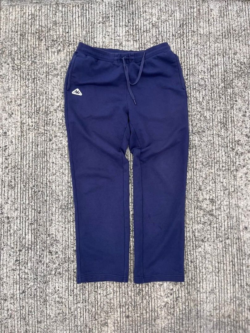 Kappa Navy Blue Sweatpants (Category: Joggers) located in Manila. Submitted by allenspov_ (Listing ID 1446780295, Image 1). Description: - Navy blue Kappa sweatpants - Elastic waistband with drawstring - Comfortable for lounging or casual wear - Kappa logo featured on the left hip.