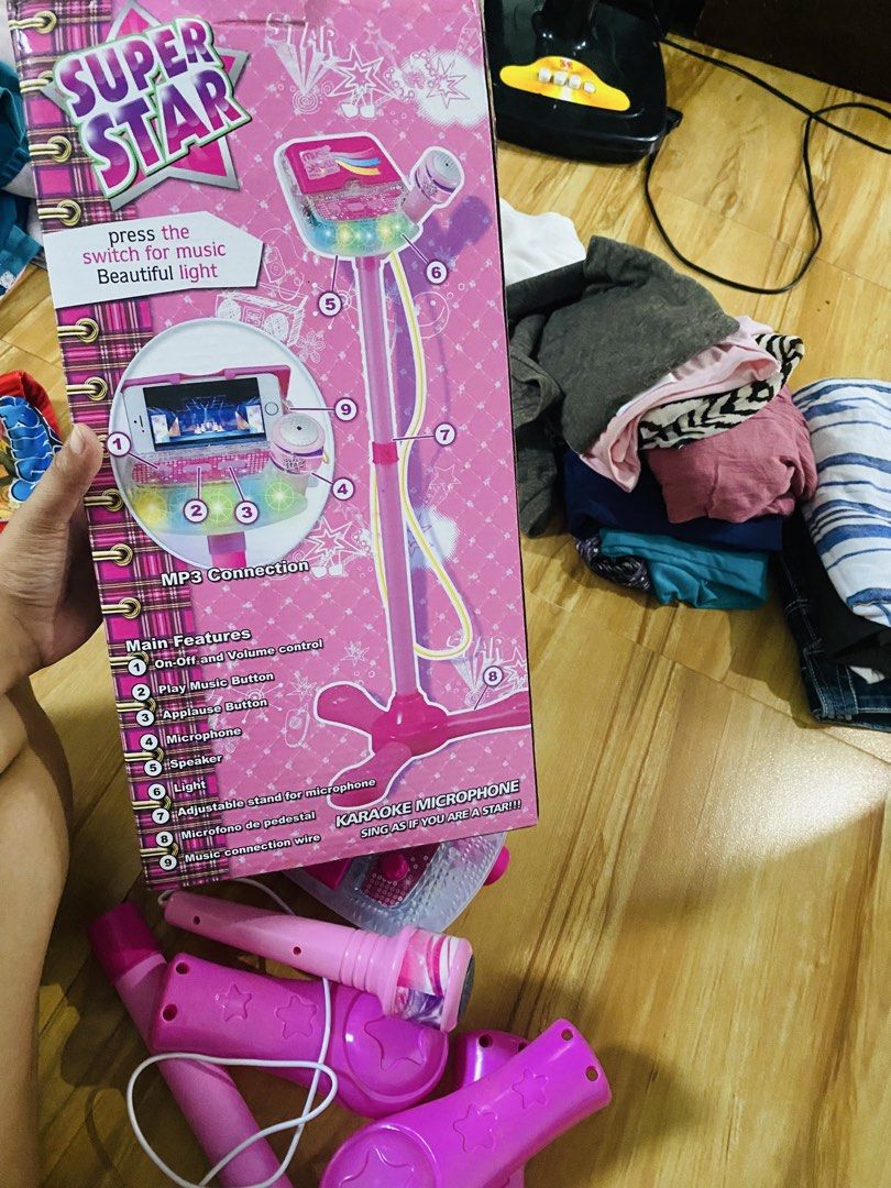 Karaoke microphone for kids (Category: Microphones) located in Manila. Submitted by liezl_27 (Listing ID 1446824945, Image 2). Description: ❤️on off mic volume control ❤️play music botton ❤️microphone ❤️speaker ❤️light ❤️adjustable stand for microphone.