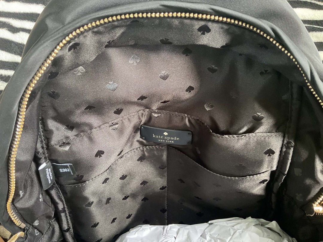 Kate Spade Chelsea Nylon Medium Backpack (Category: Luxury Bags & Wallets) located in Bulacan. Submitted by garmentsbyadi. (Listing ID 1446759934, Image 3). Description: Authentic Kate Spade New York Chelsea Nylon Medium Backpack ✨ 100% Authentic In mint condition, this Kate Spade Chelsea Medium Backpack is crafted from lightweight, durable nylon with refined leather trim, making it perfect for everyday use, work, school, or travel. Its spacious 