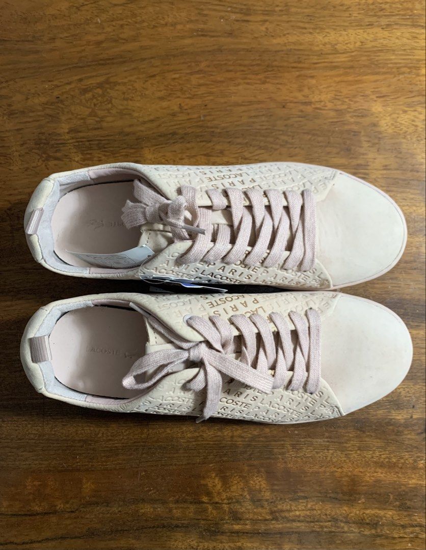 Lacoste Paris Embossed Sneakers (Category: Sneakers) located in Calumpit. Submitted by declutterwithajm (Listing ID 1446822390, Image 1). Description: - bought from 🇺🇸 outlet (w/o box) - blush pink in person - never been worn - little bit dirty due to storage but overall still in a good wearable condition.