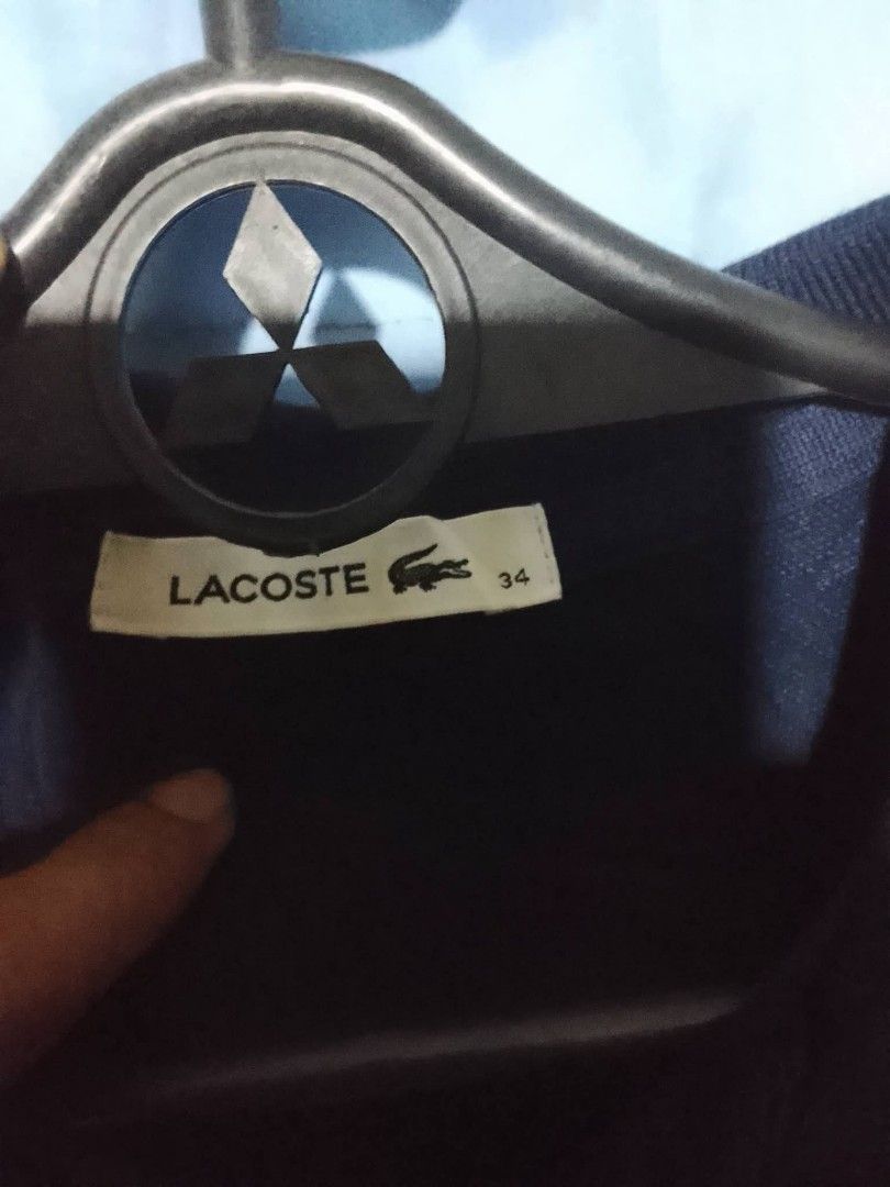 LACOSTE POLO DRESS size 34 (Category: Dresses) located in San Carlos City. Submitted by apyogone (Listing ID 1446861228, Image 3). Description: LACOSTE DRESS NAVY BLUE SIZE 34 AS NEW CONDITION COLOR RATE 9.9 NO ISSUE.
