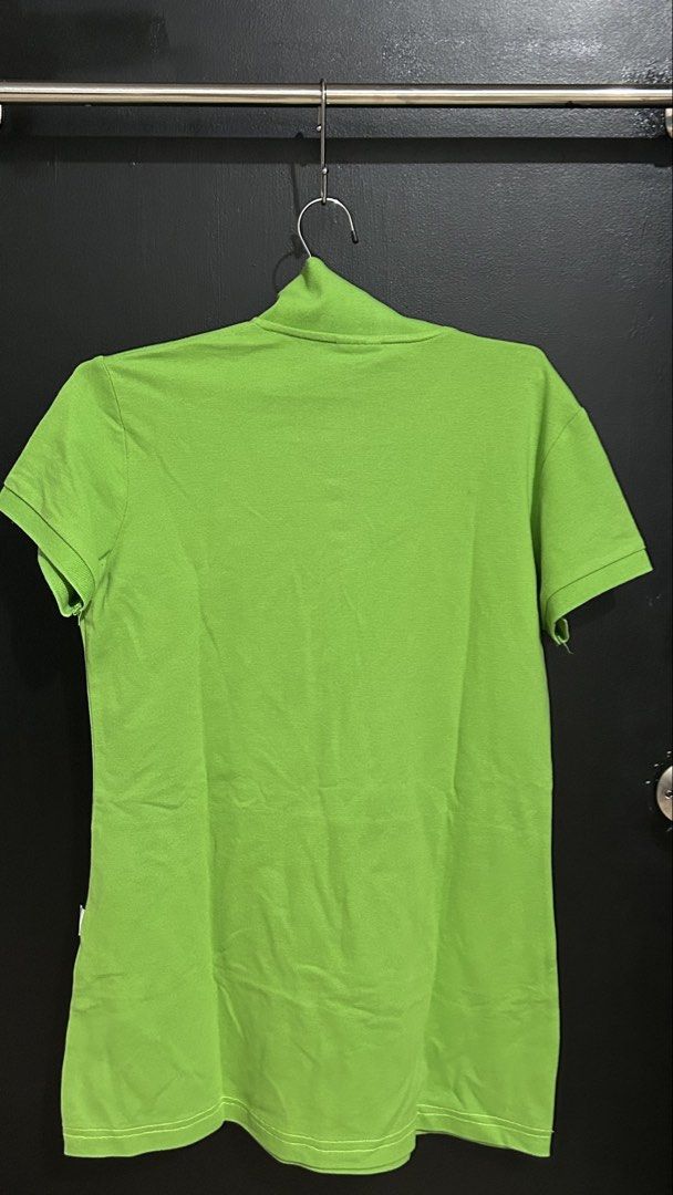Lacoste x Michael Young Plastic Polo Shirt (Category: Tshirts & Polo Shirts ) located in San Fernando. Submitted by TheBTBs (Listing ID 1446896426, Image 3). Description: - Bright green polo shirt - Collaboration: Lacoste x Michael Young - Design: Short sleeves, collar, button placket - Features: Two large front pockets - Style: Ideal for casual wear Size: S-M frame ⚠️ Reminder Color may appear slightly different in photos due to lighting and scr