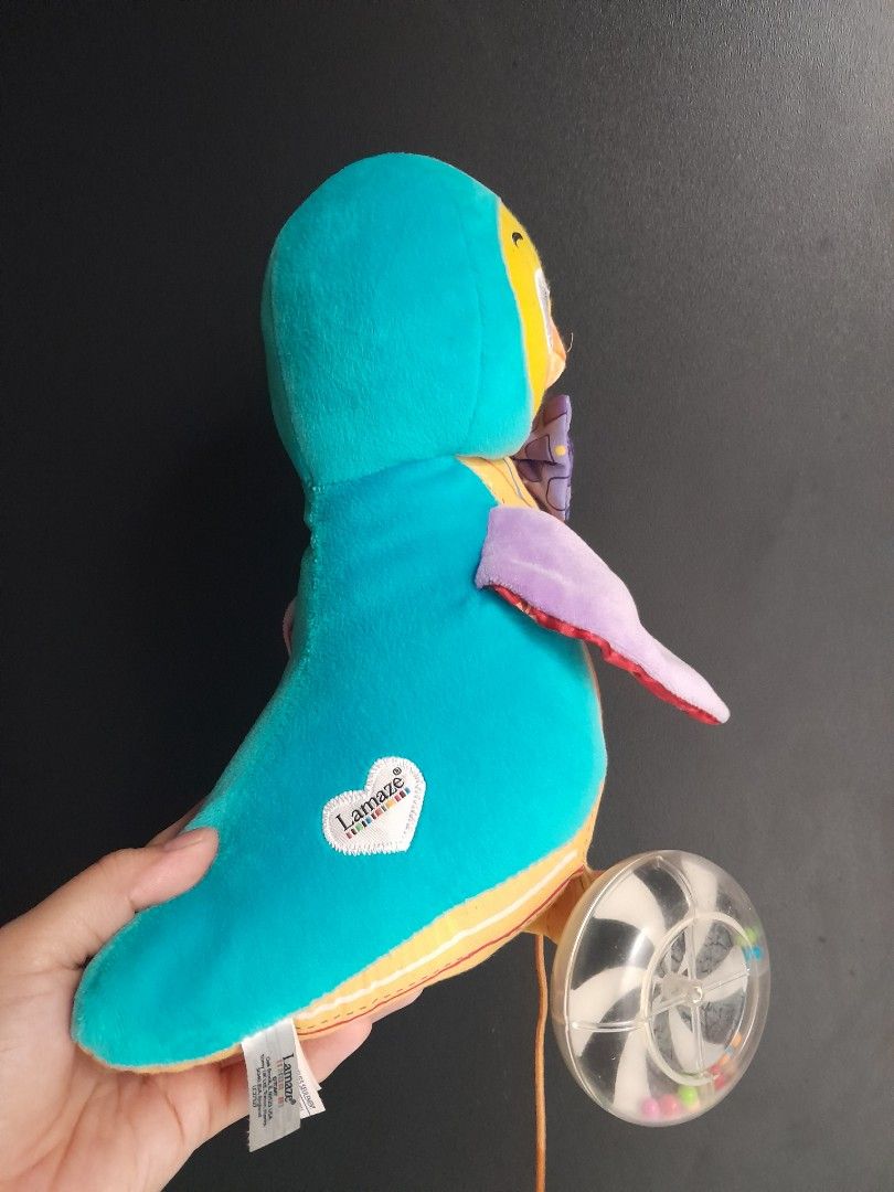 Lamaze Sensory Pull-along toy (Category: Infant Playtime) located in Manila. Submitted by sulitfinds_17 (Listing ID 1446806545, Image 2). Description: 🐧Lamaze "Walter the Waddling Penguin" sensory pull-along toy. ✨️It features crinkle wings, bead-filled wheels, and a purple bow tie.Designed for toddlers to develop gross motor skills by walking and pulling the toy. Aged 9 months to 3 years old..