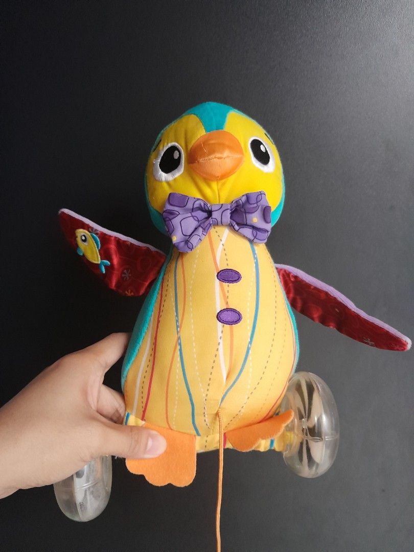 Lamaze Sensory Pull-along toy (Category: Infant Playtime) located in Manila. Submitted by sulitfinds_17 (Listing ID 1446806545, Image 1). Description: 🐧Lamaze "Walter the Waddling Penguin" sensory pull-along toy. ✨️It features crinkle wings, bead-filled wheels, and a purple bow tie.Designed for toddlers to develop gross motor skills by walking and pulling the toy. Aged 9 months to 3 years old..