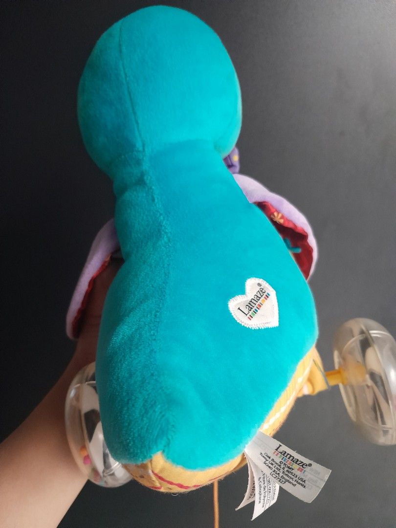 Lamaze Sensory Pull-along toy (Category: Infant Playtime) located in Manila. Submitted by sulitfinds_17 (Listing ID 1446806545, Image 3). Description: 🐧Lamaze "Walter the Waddling Penguin" sensory pull-along toy. ✨️It features crinkle wings, bead-filled wheels, and a purple bow tie.Designed for toddlers to develop gross motor skills by walking and pulling the toy. Aged 9 months to 3 years old..