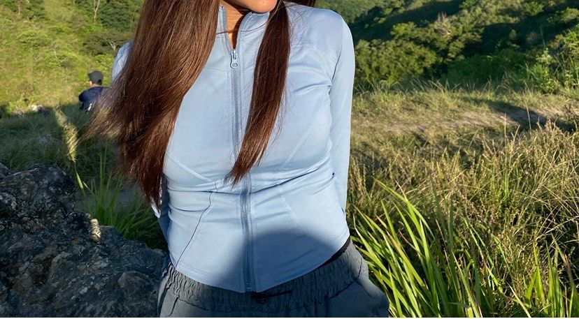 Light Blue Zip-Up Activewear Jacket with Thumbholes (Category: Activewear) located in Manila. Submitted by dlrsbl (Listing ID 1446850287, Image 1). Description: - Light blue zip-up jacket - Long sleeves with thumbholes - Smooth and stretchy material - Snug fit, great for layering - Ideal for workouts or casual wear - can fit xs - medium frame - worn once for a hike.