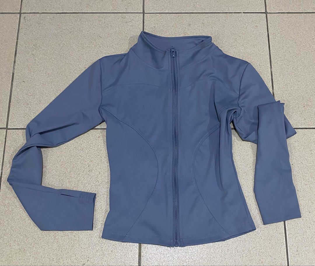 Light Blue Zip-Up Activewear Jacket with Thumbholes (Category: Activewear) located in Manila. Submitted by dlrsbl (Listing ID 1446850287, Image 2). Description: - Light blue zip-up jacket - Long sleeves with thumbholes - Smooth and stretchy material - Snug fit, great for layering - Ideal for workouts or casual wear - can fit xs - medium frame - worn once for a hike.