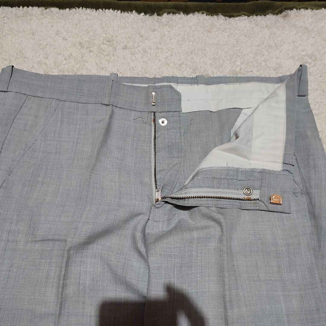 Light Grey Tailored Dress Pants (Category: Other Bottoms) located in Manila. Submitted by anthonig (Listing ID 1446794226, Image 2). Description: Length: 37 inches Width: 34 inches Hem: 9 inches Price: 200 pesos Condition: 8.8/10 Issues: 2nd pic zipper stain PM if interested or for inquiries Meetups within MANILA only Can do shipping at buyers expense.