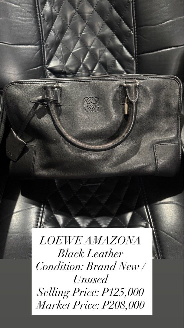 LOEWE Amazona Black Leather Handbag (Category: Luxury Bags & Wallets) located in Quezon City. Submitted by cmgood (Listing ID 1446840525, Image 1). Description: - Authentic LOEWE Amazona Bag - Color: Black - Material: Genuine Leather - Condition: Brand New, Unused - Original Retail Price: P208,000 - A timeless and classic luxury piece.