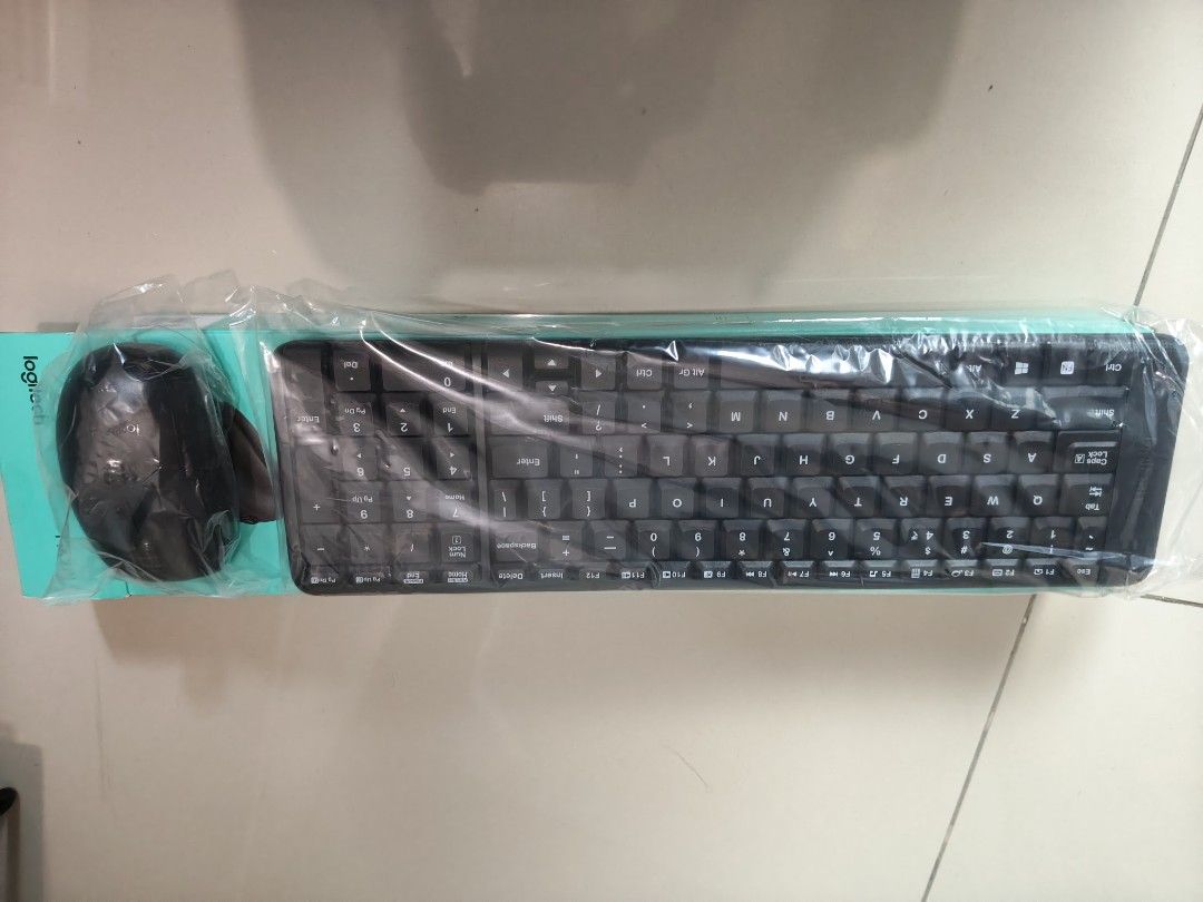 Logitech MK215 wireless keyboard and mouse combo (Category: Mouse & Mousepads) located in Makati City. Submitted by caithellyn81113 (Listing ID 1446809869, Image 2). Description: Brand new, received as a gift..