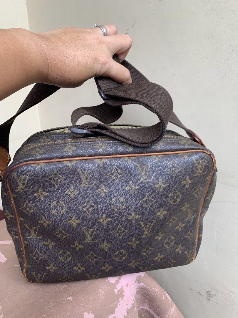 Louis Vuitton Monogram Canvas Crossbody Bag (Category: Luxury Bags & Wallets) located in Liloan. Submitted by jinalyns (Listing ID 1446736987, Image 2). Description: - Classic Louis Vuitton monogram canvas crossbody bag - Signature brown LV pattern - Leather trim and adjustable canvas strap - Main zippered compartment with interior pockets - Ideal for everyday use - Shows some signs of wear on leather trim and strap.