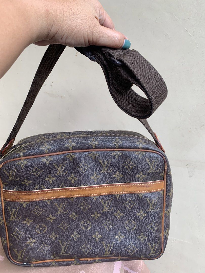 Louis Vuitton Monogram Canvas Crossbody Bag (Category: Luxury Bags & Wallets) located in Liloan. Submitted by jinalyns (Listing ID 1446736987, Image 1). Description: - Classic Louis Vuitton monogram canvas crossbody bag - Signature brown LV pattern - Leather trim and adjustable canvas strap - Main zippered compartment with interior pockets - Ideal for everyday use - Shows some signs of wear on leather trim and strap.