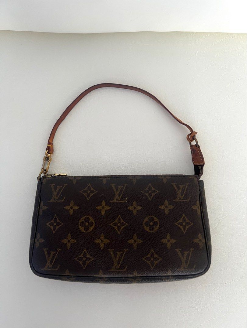 LV Pochette (Category: Luxury Bags & Wallets) located in Tagum. Submitted by shwzzzd (Listing ID 1446823154, Image 1). Description: Vintage LV Pochette Guaranteed authentic Louis Vuitton LV Pochette accessoires.