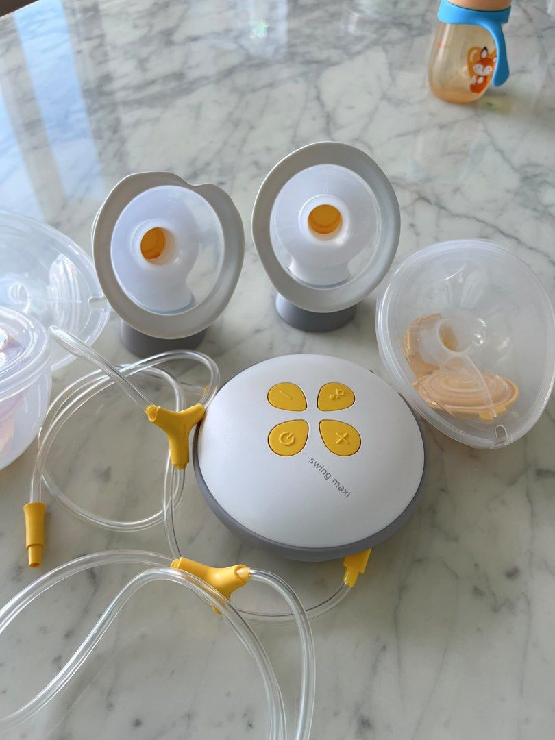 Medela Swing Maxi Double Electric Breast Pump （分類：護理及餵哺 - 母乳及奶瓶）位於 Hong Kong。 由 ealinetian 提交（商品編號 1446737348，圖片 1）。簡介： Selling a Medela Swing Maxi double electric breast pump. Includes two breast shields, tubing, and the main unit. Great for efficient milk expression. Easy to use and clean. Ready for its next owner.。