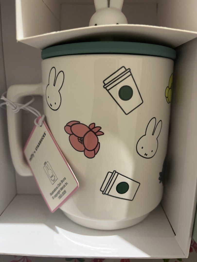 Miffy + Starbucks Collaboration Mug with Lid (Category: Coffee & Tea Tableware) located in San Fernando. Submitted by minkartmin (Listing ID 1446895151, Image 2). Description: On hand and can do rush shipping. Miffy + Starbucks US and Canada exclusive mug with lid and Miffy figurine topper. The box is included and has no dents. This was bought in Canada. Bought for 3,600 on fb. Negotiable. Can send more pictures and details. RFS: Was gifted one..