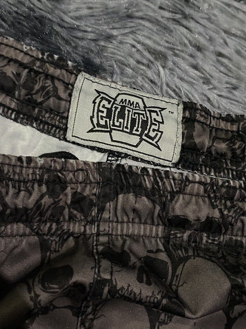 MMA ELITE SKULLPILE SHORTS (Category: Shorts) located in San Pablo. Submitted by d.iznu (Listing ID 1446856259, Image 3). Description: 40x21.5 affliction, billabong, monster energy, fox, tapout, boxing.
