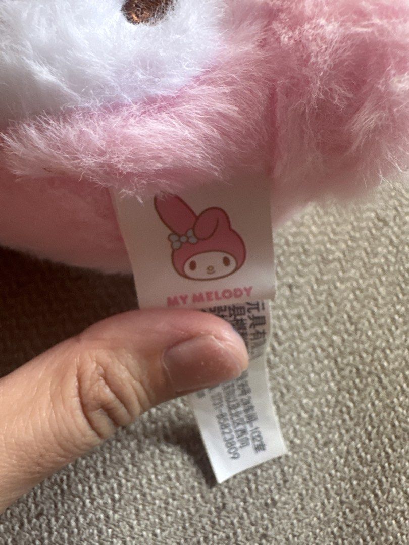 My Melody Pink Fluffy Plush Keychain set (Category: Plushies & Soft Toys) located in Cainta. Submitted by shopbyyna (Listing ID 1446785724, Image 3). Description: - Adorable pink My Melody plush keychain - Features a cute blue bow on the back - Equipped with a clip for easy attachment to bags, backpacks, or keys - A must-have for any Sanrio enthusiast!.