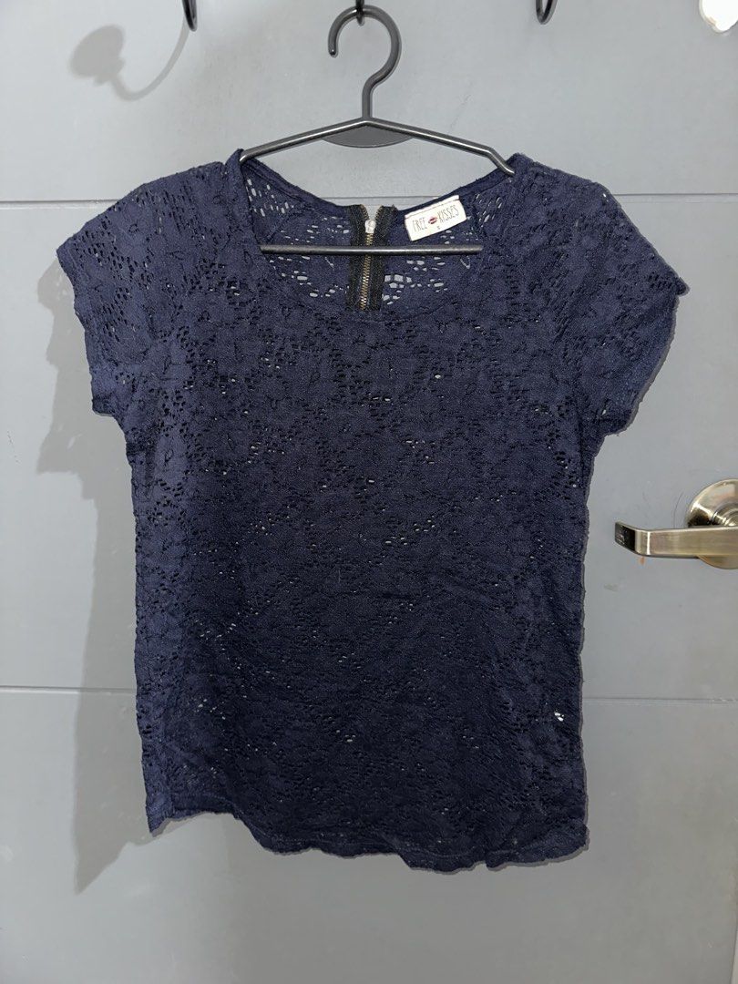 Navy Blue Lace Top with Zipper (Category: Sleeveless) located in Rizal. Submitted by ryannesua47021 (Listing ID 1446860005, Image 2). Description: - Navy blue floral lace top - Short sleeves - Zipper closure at the back neckline - Perfect for dressing up or down.