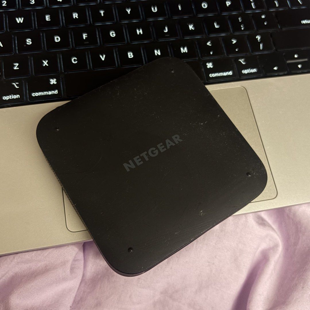 NETGEAR Nighthawk M5 MR5200 5G Mobile Router (Category: Networking) located in Makati City. Submitted by valentine444 (Listing ID 1446856770, Image 2). Description: Slightly negotiable (Retails for 40.000-50.000) No Charger RFS: Decluttering 📍 Acqua Residences, Mandaluyong Netgear Nighthawk M5 MR5200 5G Mobile Router - Supports blazing-fast 5G internet - Wi-Fi 6 enabled for superior wireless performance - Compact design with a status screen - Ea