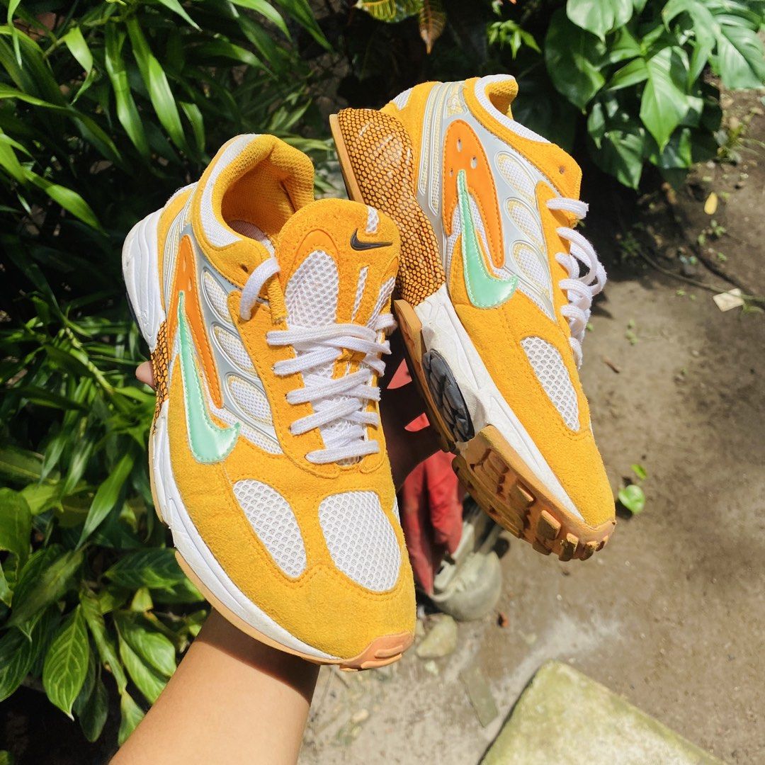 Nike Air Max 270 React "Laser Orange" Yellow Sneakers (Category: Sneakers) located in Manila. Submitted by markuztimo62237 (Listing ID 1446887074, Image 2). Description: - Nike Air Max 270 React sneakers - Color: Yellow and orange with white mesh and mint green accents - Ideal for everyday wear, walking, and casual outings - Features a unique sole design.