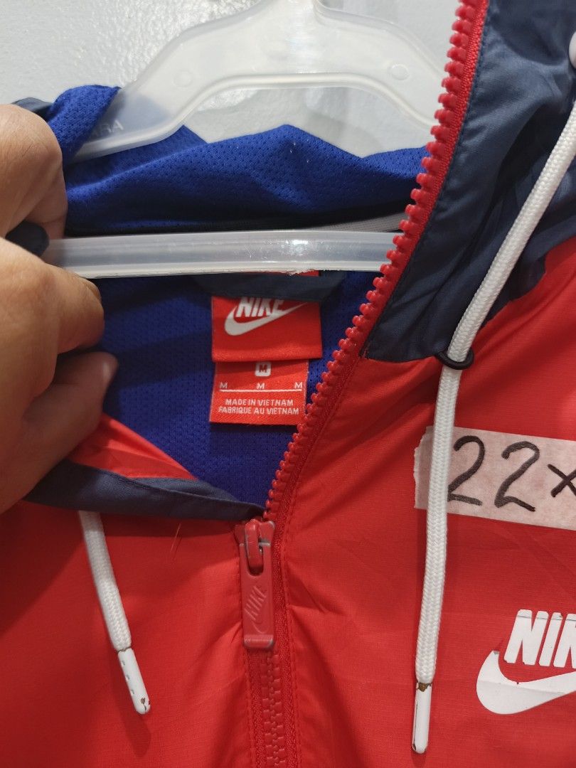 Nike Tritone Windbreaker Jacket (Category: Coats, Jackets and Outerwear) located in Leyte. Submitted by chaem89 (Listing ID 1446830705, Image 3). Description: Nike Tritone Windbreaker Jacket Excellent Condition *issue on print (please refer to the the last photo) sz M on tag 22x26.