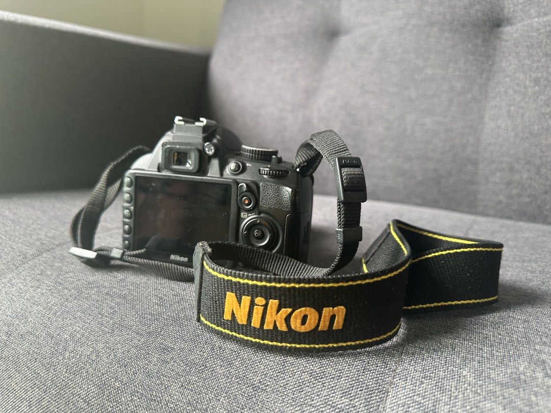 Nikon D3100 DSLR Camera with Kit Lens (Category: Cameras) located in Petaling Jaya. Submitted by marlisabrown (Listing ID 1446791578, Image 2). Description: - Nikon D3100 DSLR camera - Includes standard 18-55mm kit lens, no issue, no fungus - Shutter count: 13902 - Charger included, camera bag included - No memory card (have to buy your own) - Display screen with a slight shadow on the corner but doesn’t affect the image quality -well kept, no ru