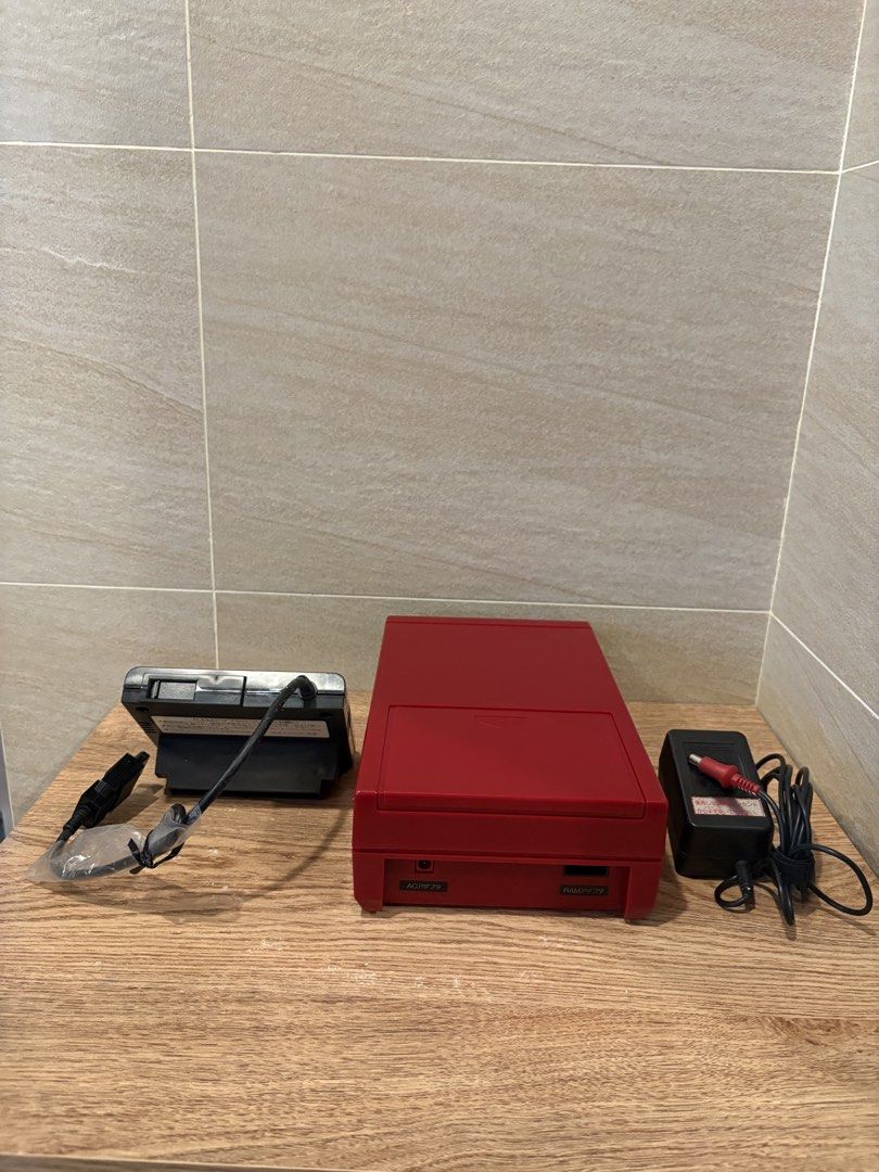 Nintendo Family Computer Disk System (Category: Nintendo) located in Quezon City. Submitted by grinner888 (Listing ID 1446885115, Image 2). Description: Family Computer Disks System w/Box. Unit works and plays disk games. Fully restored with new rubber belt. Perfect addition to your collection. (Family Computer NOT INCLUDED) No swaps. .