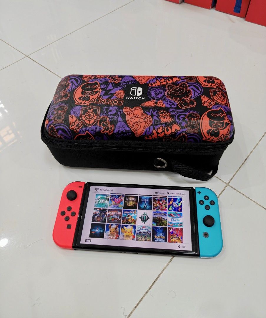 Nintendo Switch Oled with Free Game (Category: Nintendo) located in Manila. Submitted by nswitchgear (Listing ID 1446786738, Image 3). Description: Nintendo Switch OLEDs with Free Games ₱10,999 FREE acess to my Paid games Legit purchase not Jailbreak. Preloved unit with minor sign of usage Can give 7 Days personal Warranty for peace of mind. -Doon po tayo sa kaya tayong issupport, dont settle for less. Comes w/ Complete Package with pouch (Travel