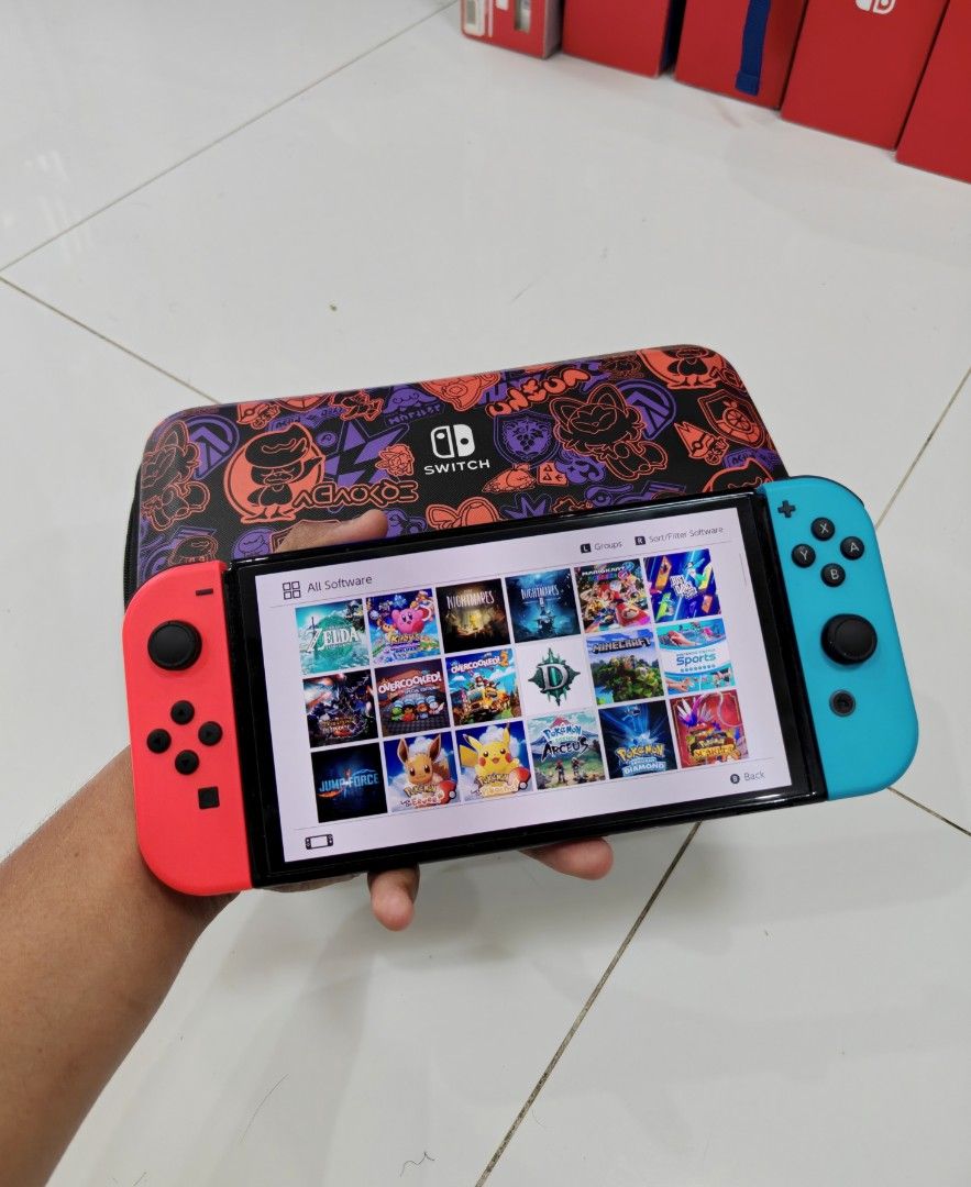 Nintendo Switch Oled with Free Game (Category: Nintendo) located in Manila. Submitted by nswitchgear (Listing ID 1446786738, Image 2). Description: Nintendo Switch OLEDs with Free Games ₱10,999 FREE acess to my Paid games Legit purchase not Jailbreak. Preloved unit with minor sign of usage Can give 7 Days personal Warranty for peace of mind. -Doon po tayo sa kaya tayong issupport, dont settle for less. Comes w/ Complete Package with pouch (Travel